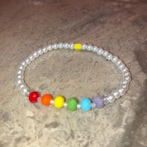 6”-6 1/4”wrist. 6mm Rainbow crystal 4mm white pearl glass bead stretch bracelet.